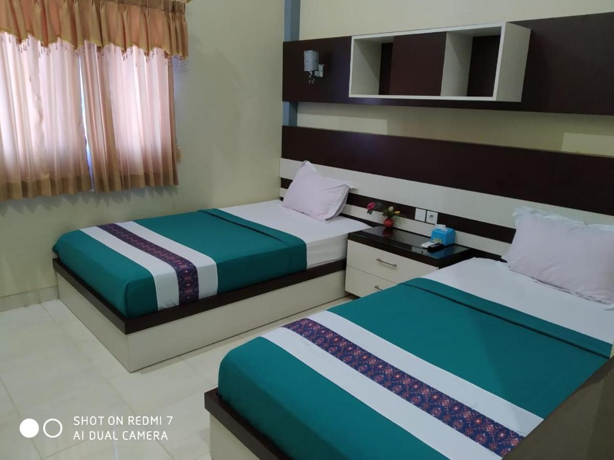 Hotel Pilar Mosa Muarawahau Экстерьер фото