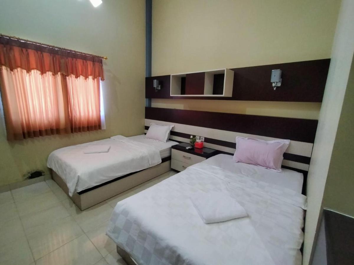 Hotel Pilar Mosa Muarawahau Экстерьер фото
